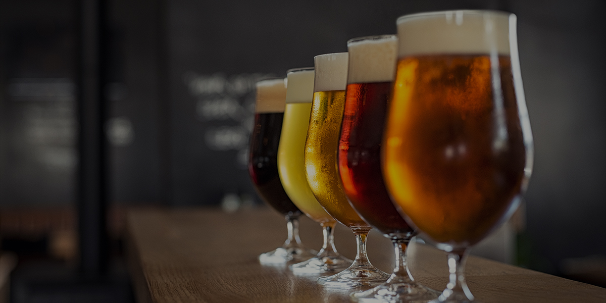 Beer getting poured from a tap